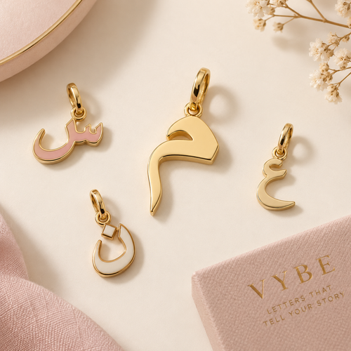VYBE Arabic letter charms concept
