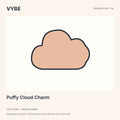Puffy Cloud Charm: rounded-cloud decorative concept illustration. Puffy describes the motif, not an approved material.